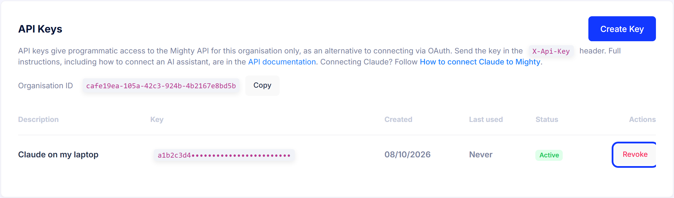 The API Keys list with the Revoke button highlighted next to an Active key